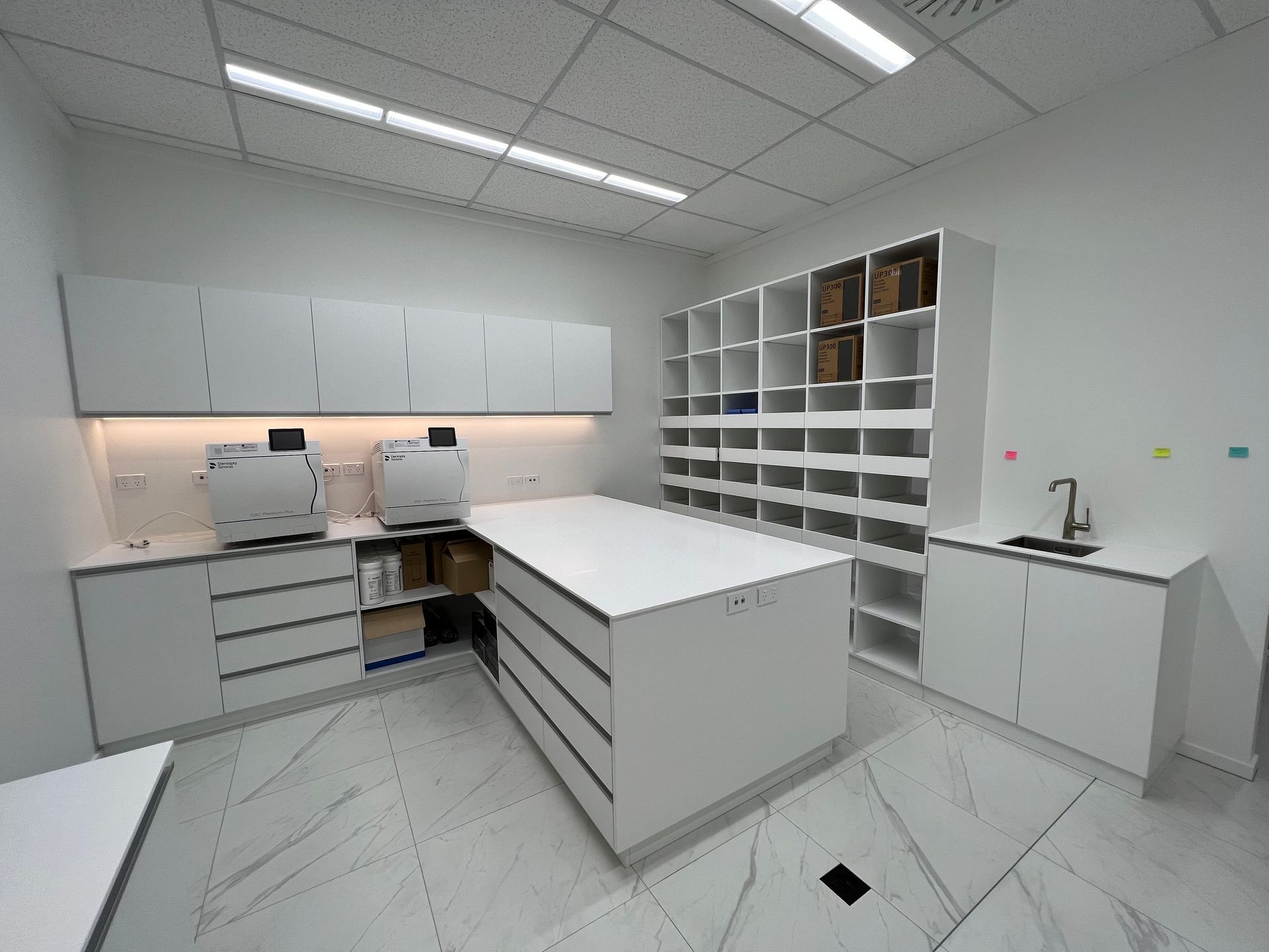 There is a large island in the middle of the room.