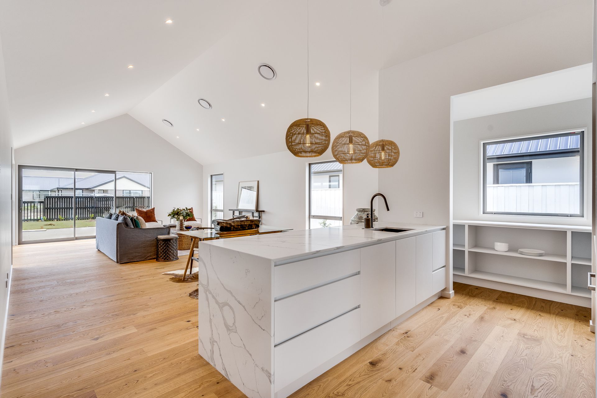 A kitchen with a large island in the middle of the room.