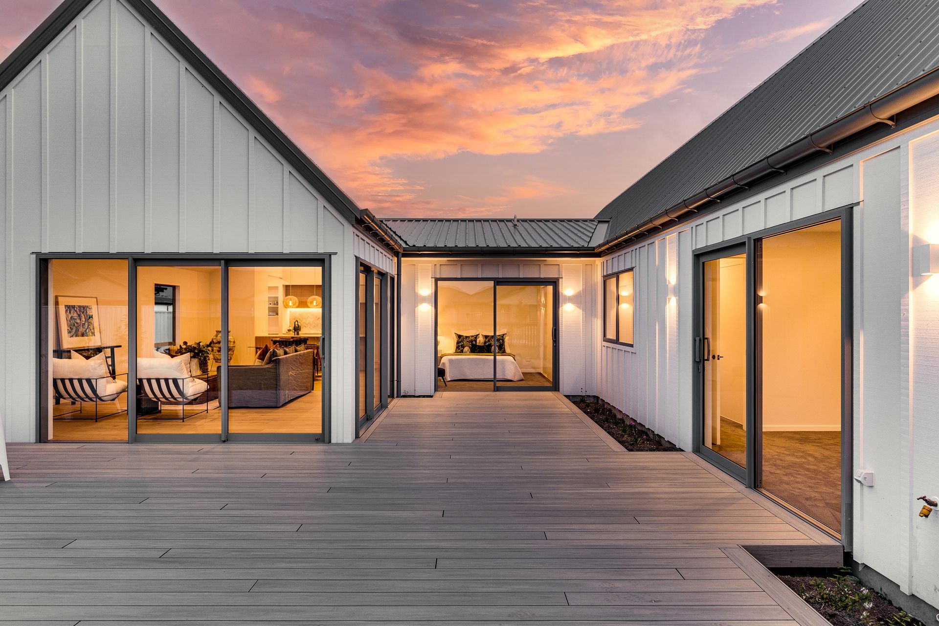 There is a large deck in the middle of the house.