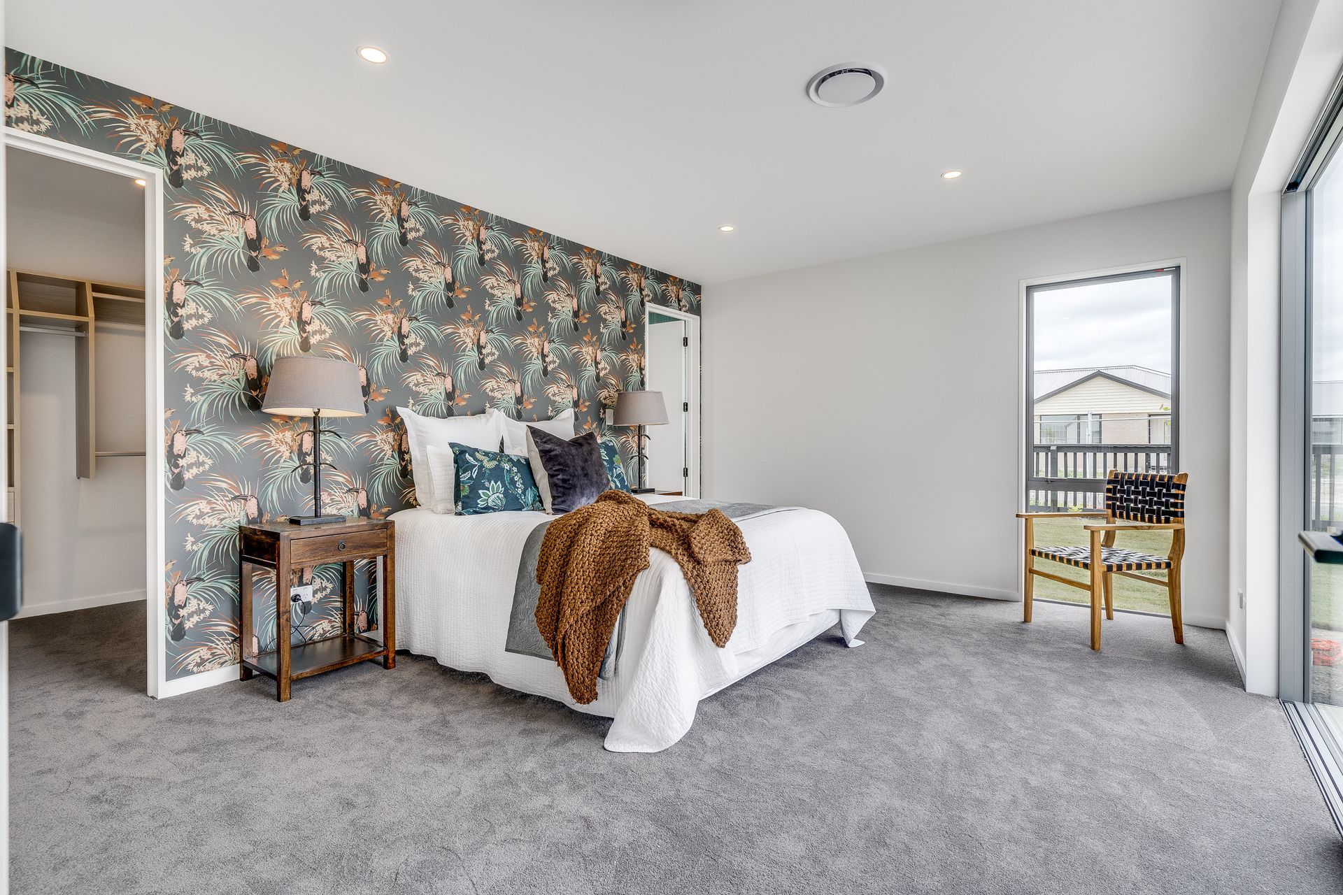 There is a large bed in the middle of the room.