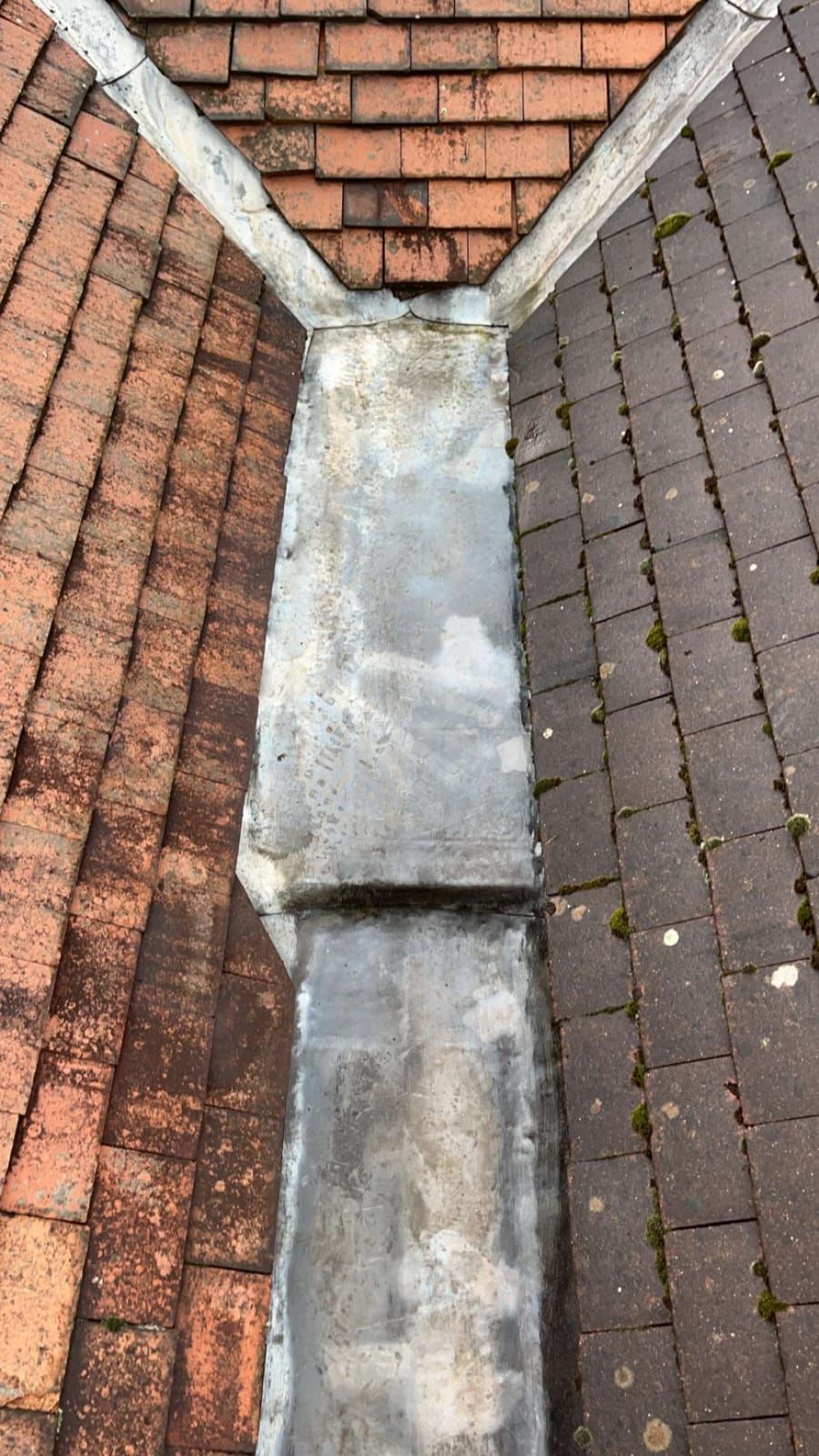 A picture of a roof before it has been cleaned by JTB Roofers Nottingham