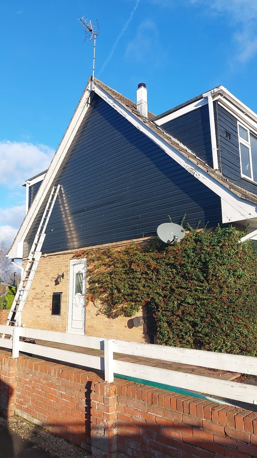 A picture of a roof being worked on by JTB Roofers Nottingham before it has dry ridge caps.