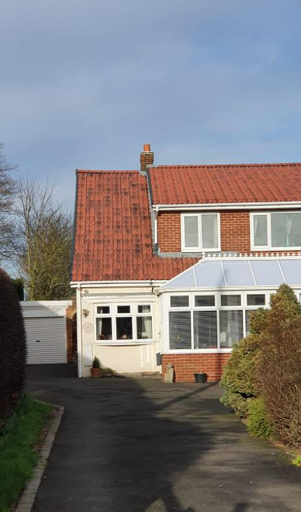 Picture of a new extension roof in red concrete tile by JTB Roofers Nottingham