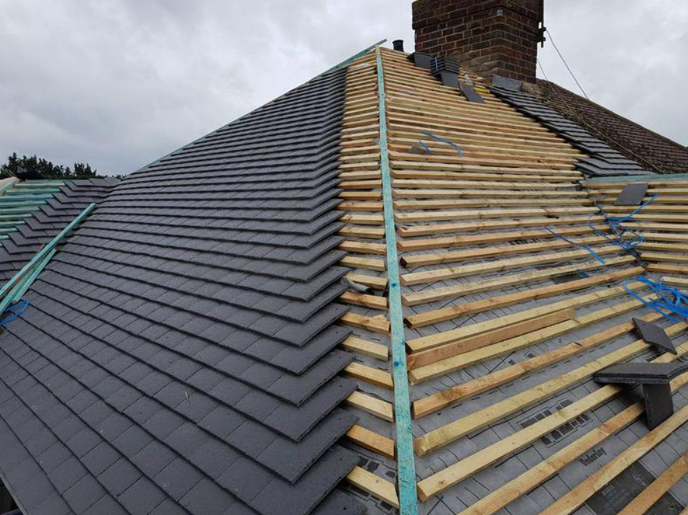 Picture of a new hipped roof during replacement by Roofers Nottingham