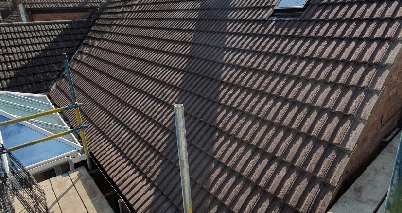 Picture of a new dark grey concrete tile roof by Roofers Nottingham