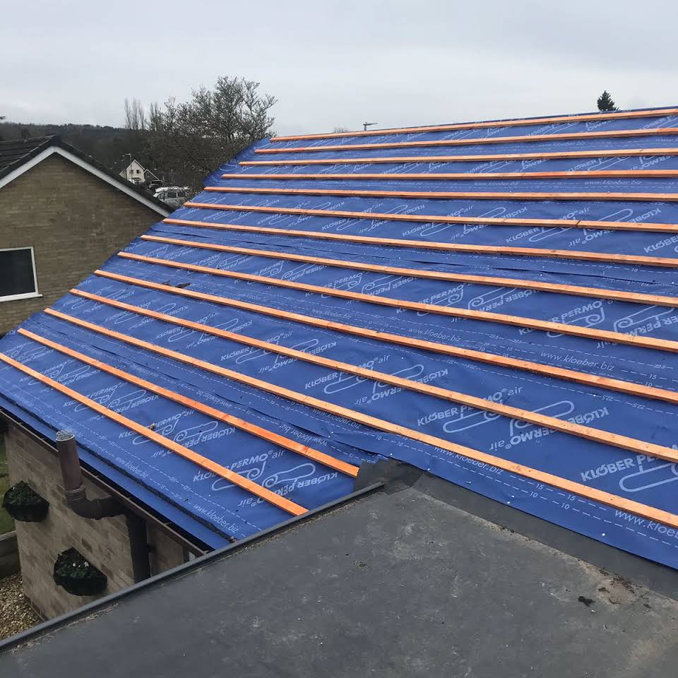 Picture of a new roof with blue felt and timber lathes by Roofers Nottingham