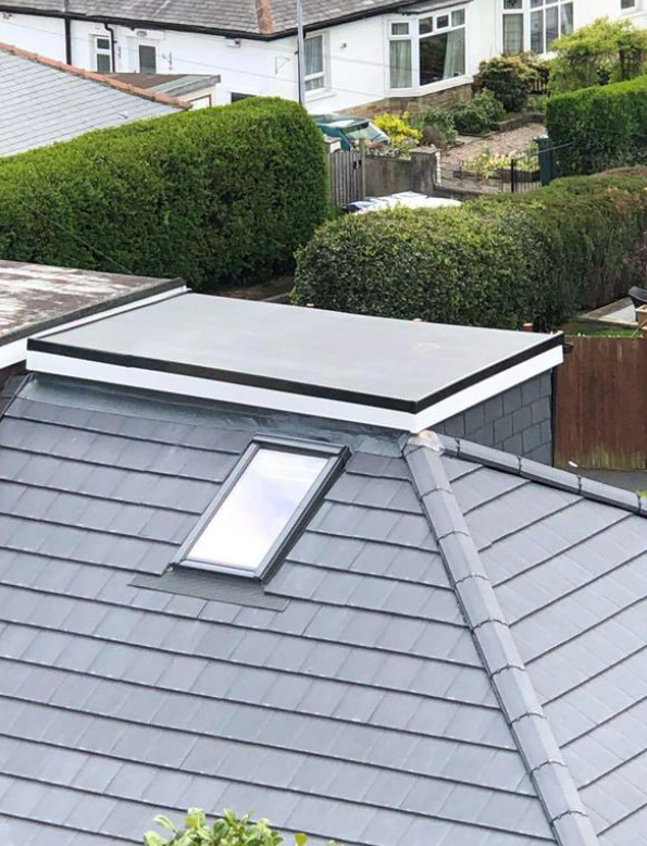 A picture of a grey pitched roof and flat roof in Nottingham