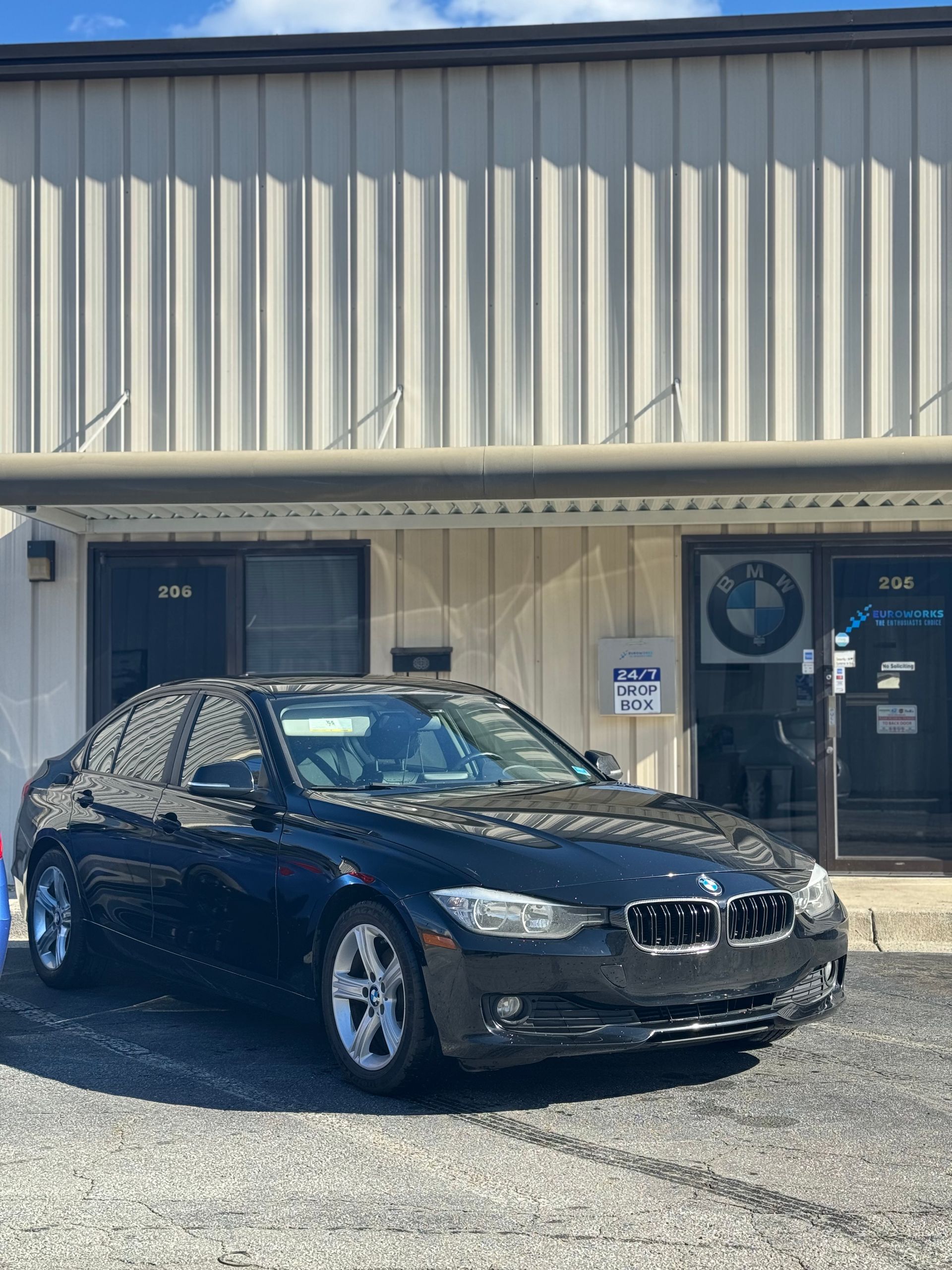 Black Car Outside the Garage | EuroWorks