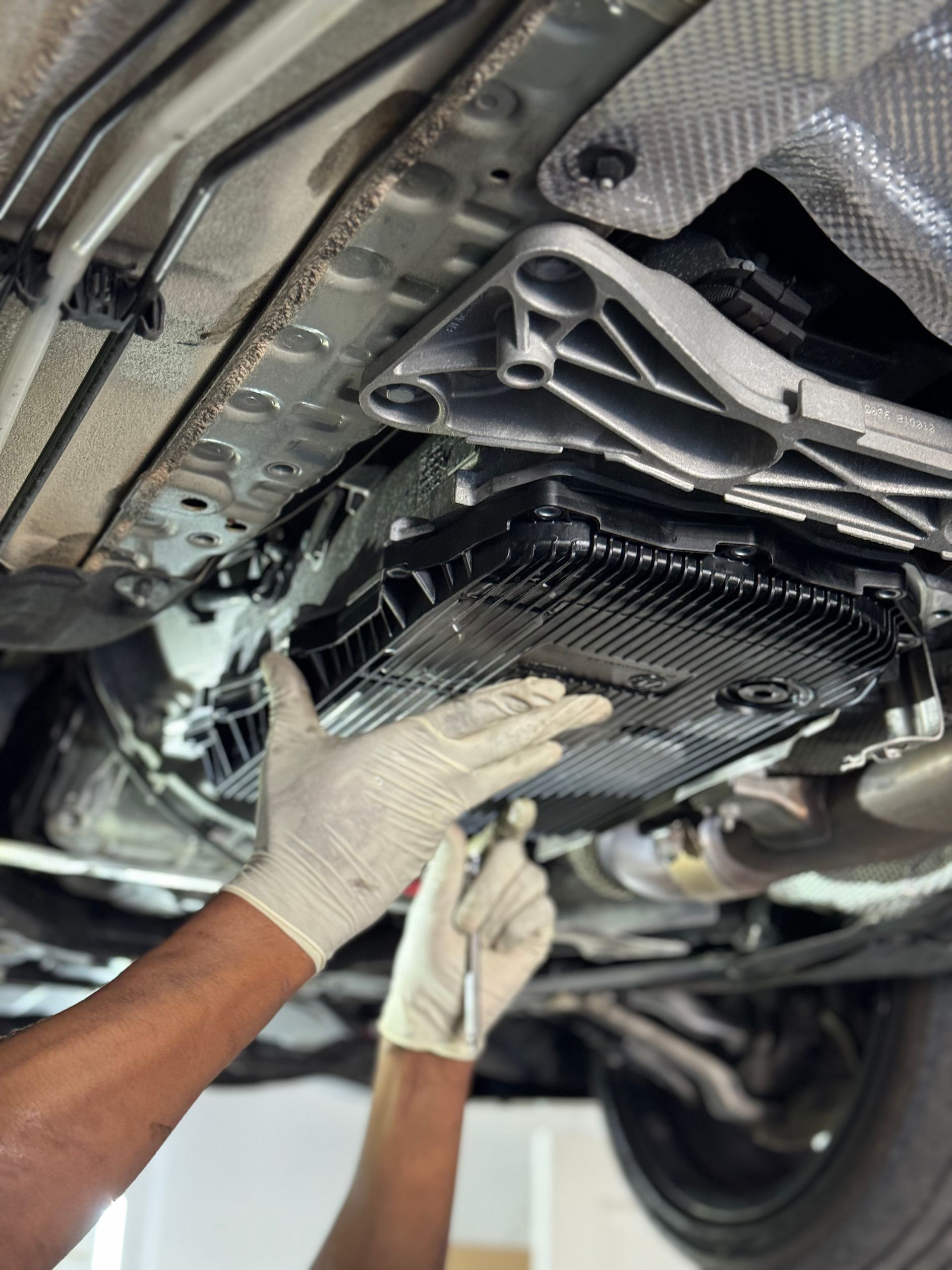 A mechanic repairing a car | EuroWorks