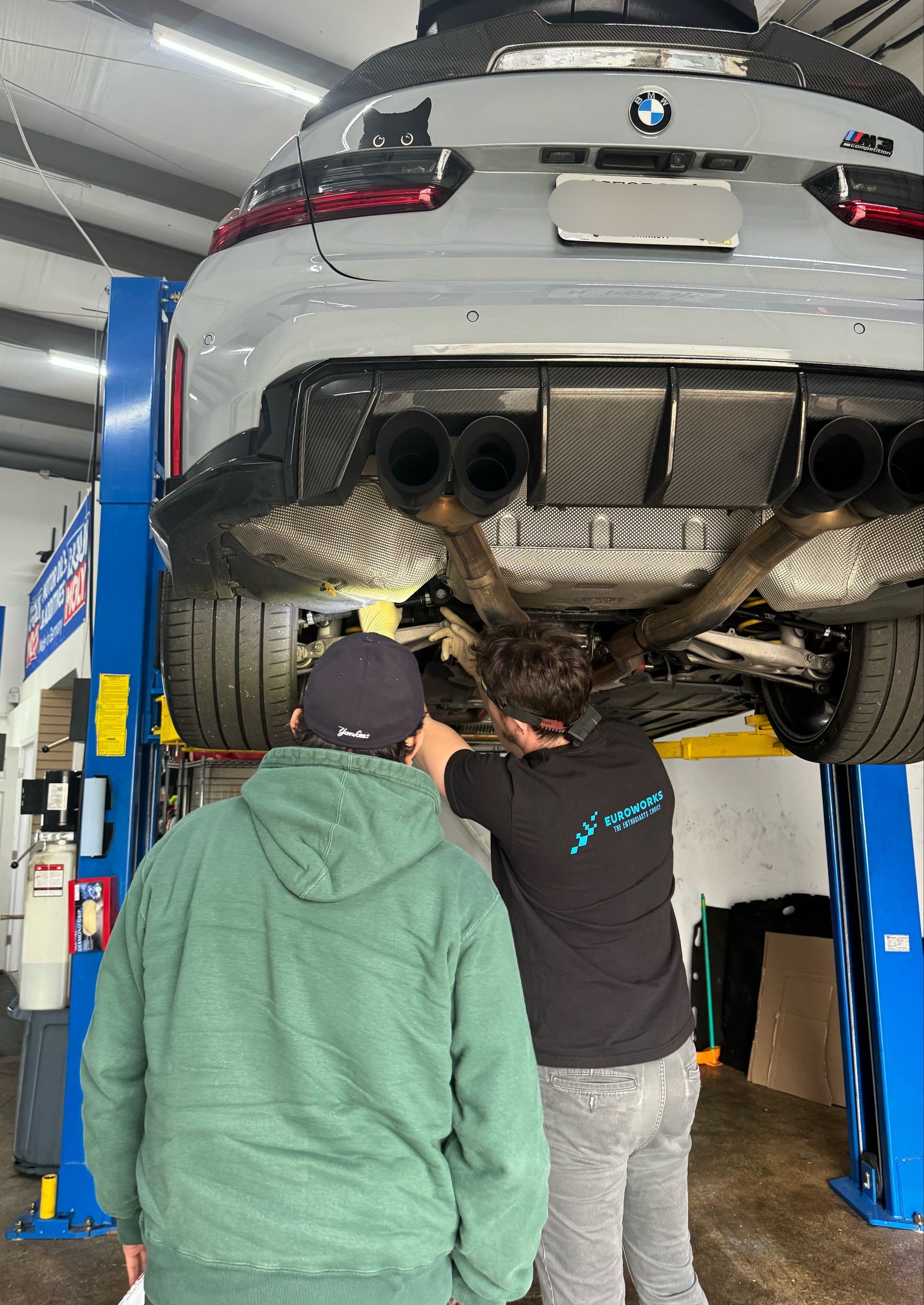 Two mechanics working on a vehicle | EuroWorks