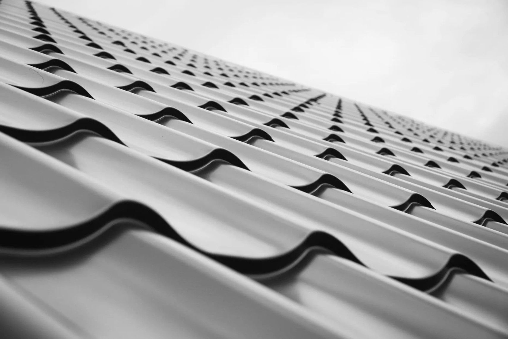 It Is A Black And White Photo Of A Roof — Roofpoint In Kawungan, QLD