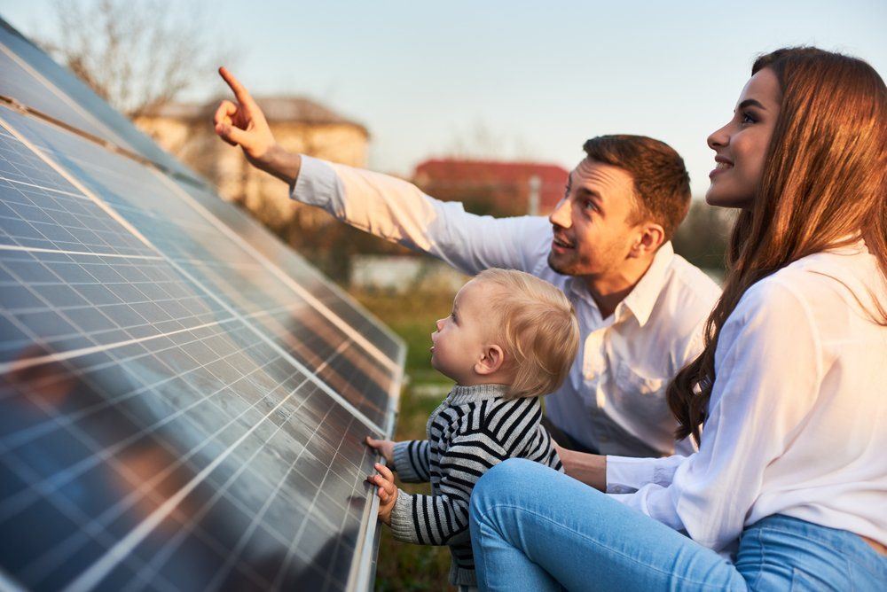 Families Are Happy Of Their Newly Built Solar Panels — Local Electricians in Mackay, QLD