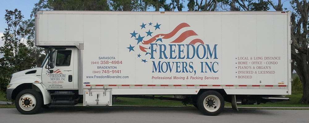 A white moving truck with 