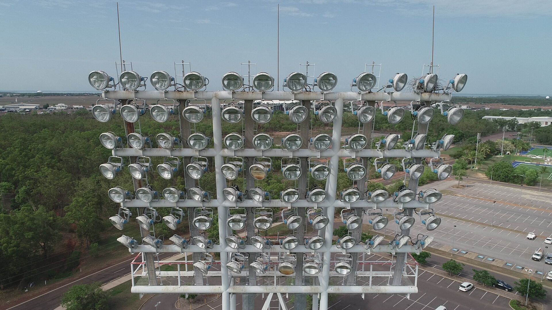 An aerial view of a stadium with a lot of lights on it.