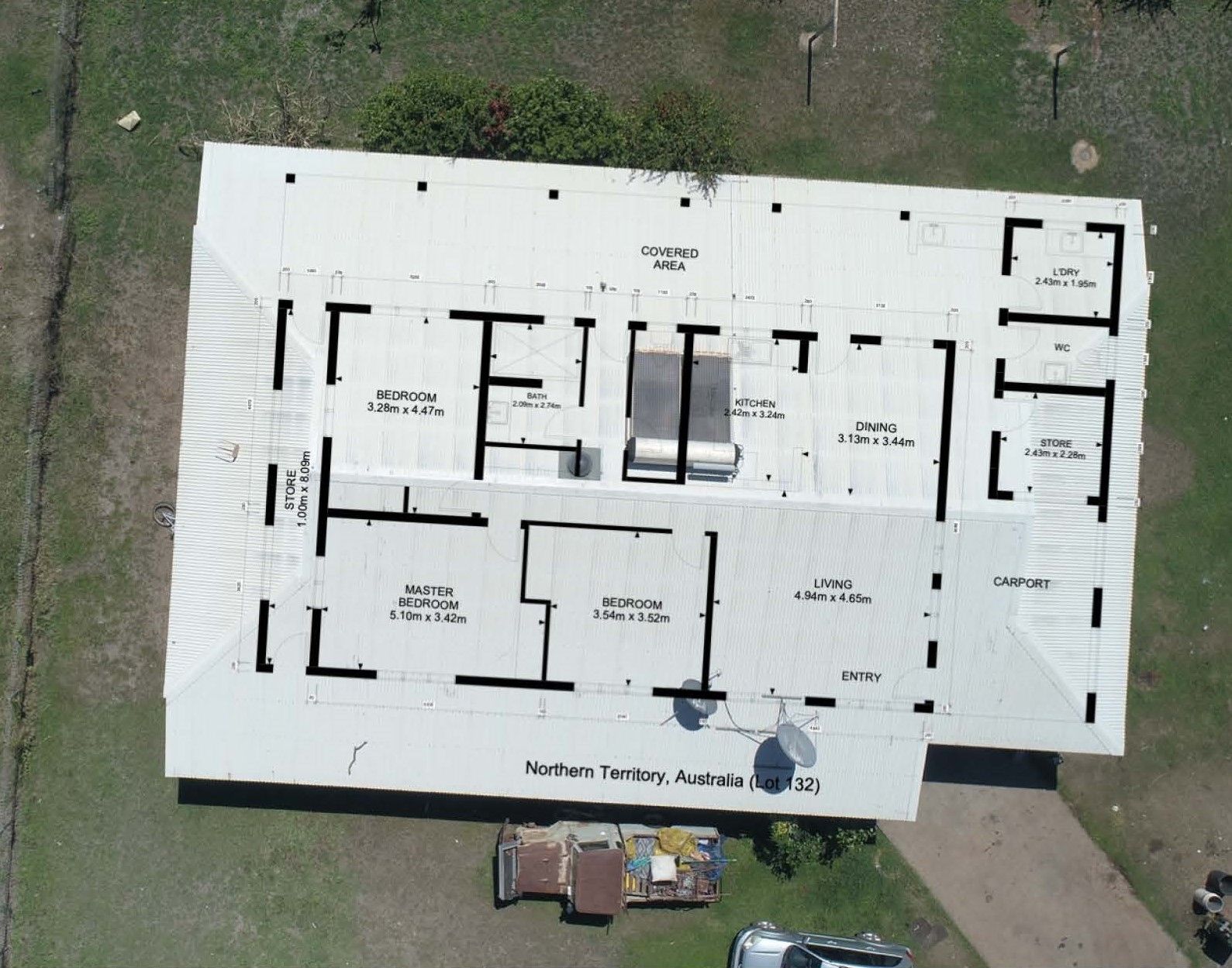 An aerial view of a roof with the letters t and i on it