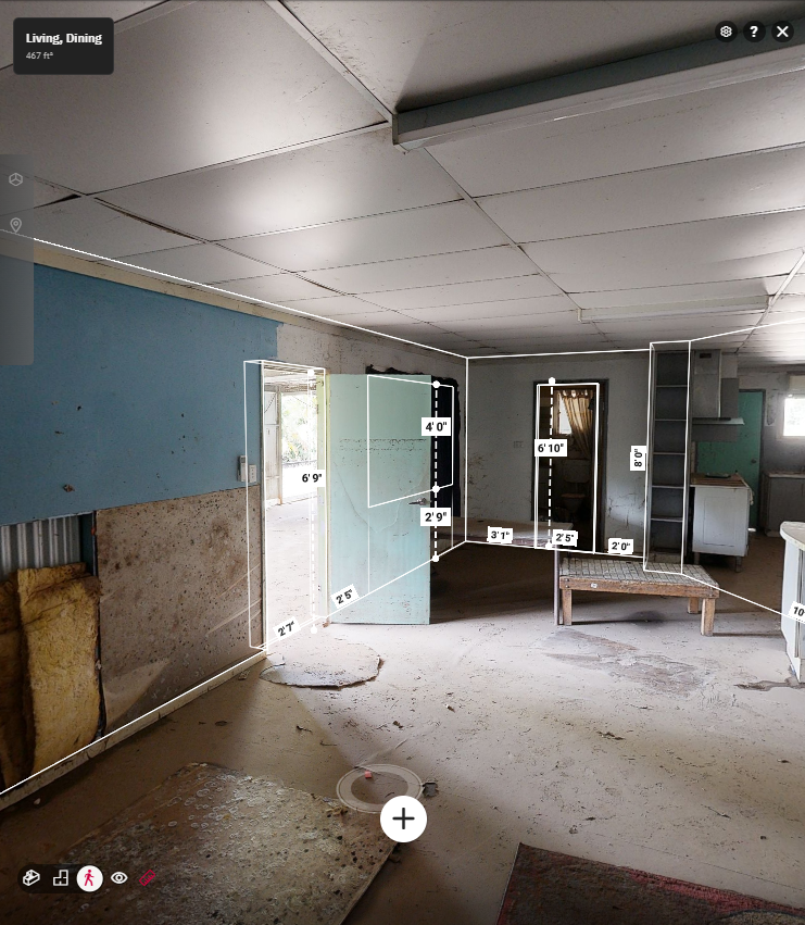 A kitchen that has been damaged by a fire.