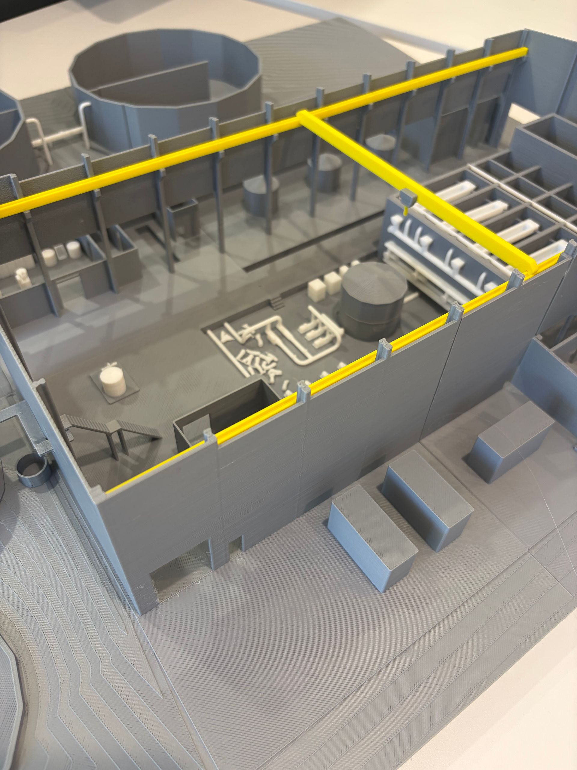 Multi coloured complex 3D print of large industrial building done in-house by Rise. 
