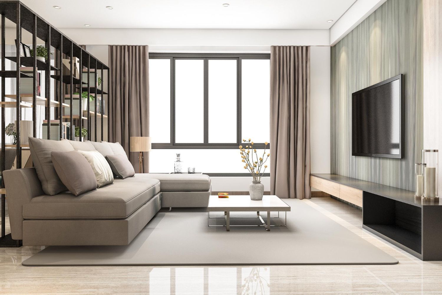 A living room with a couch , coffee table , and television.