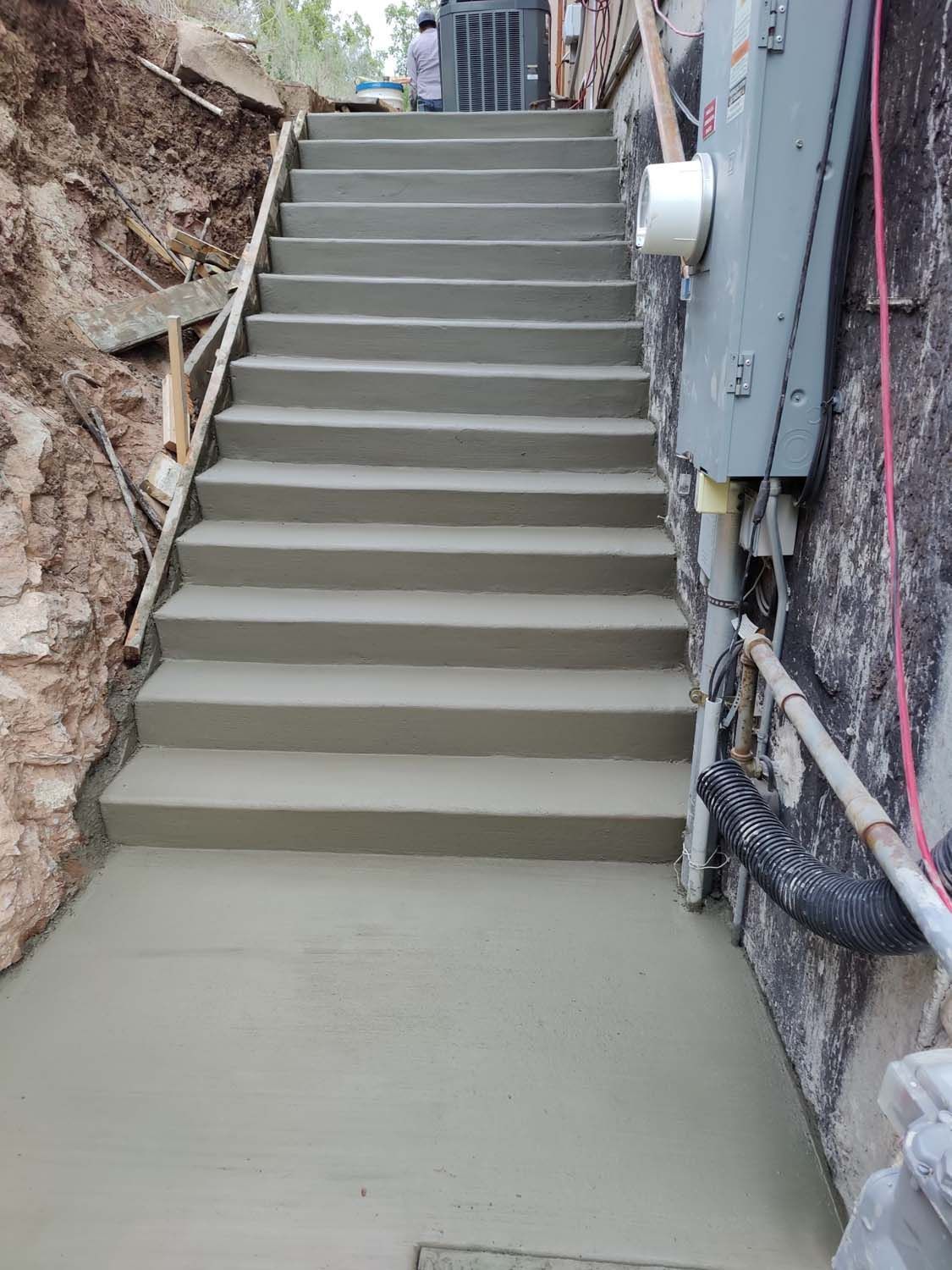 A Set of Concrete Stairs Leading Up to a Basement Under Construction