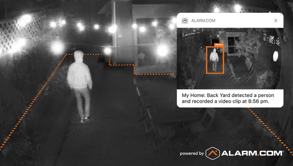 Home Security Camera showing a person in backyard