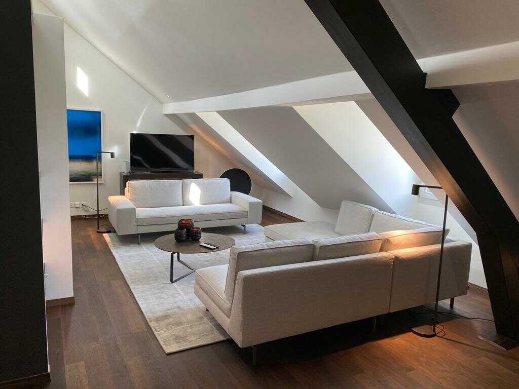 Aménagement de salon sous les combles Genève