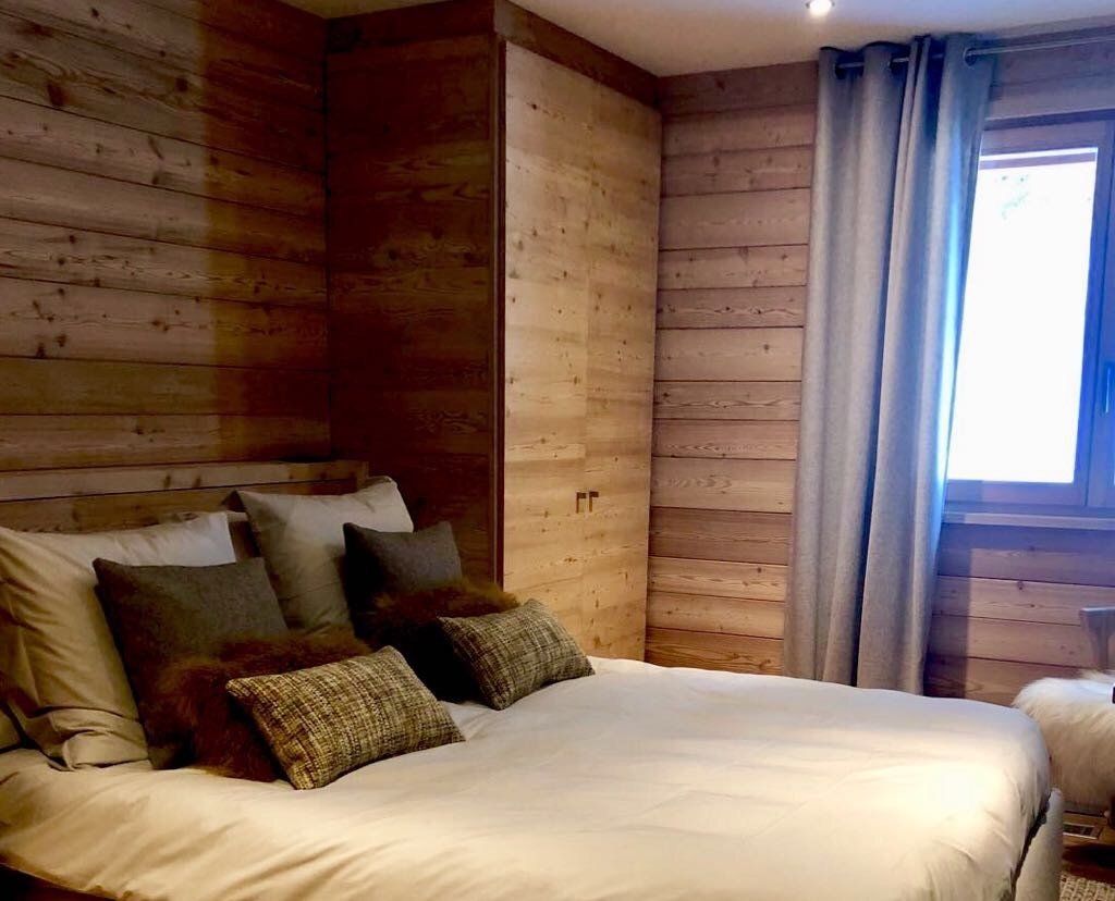 Aménagement de chalet ars vivendi Genève chambre à coucher vue d'ensemble