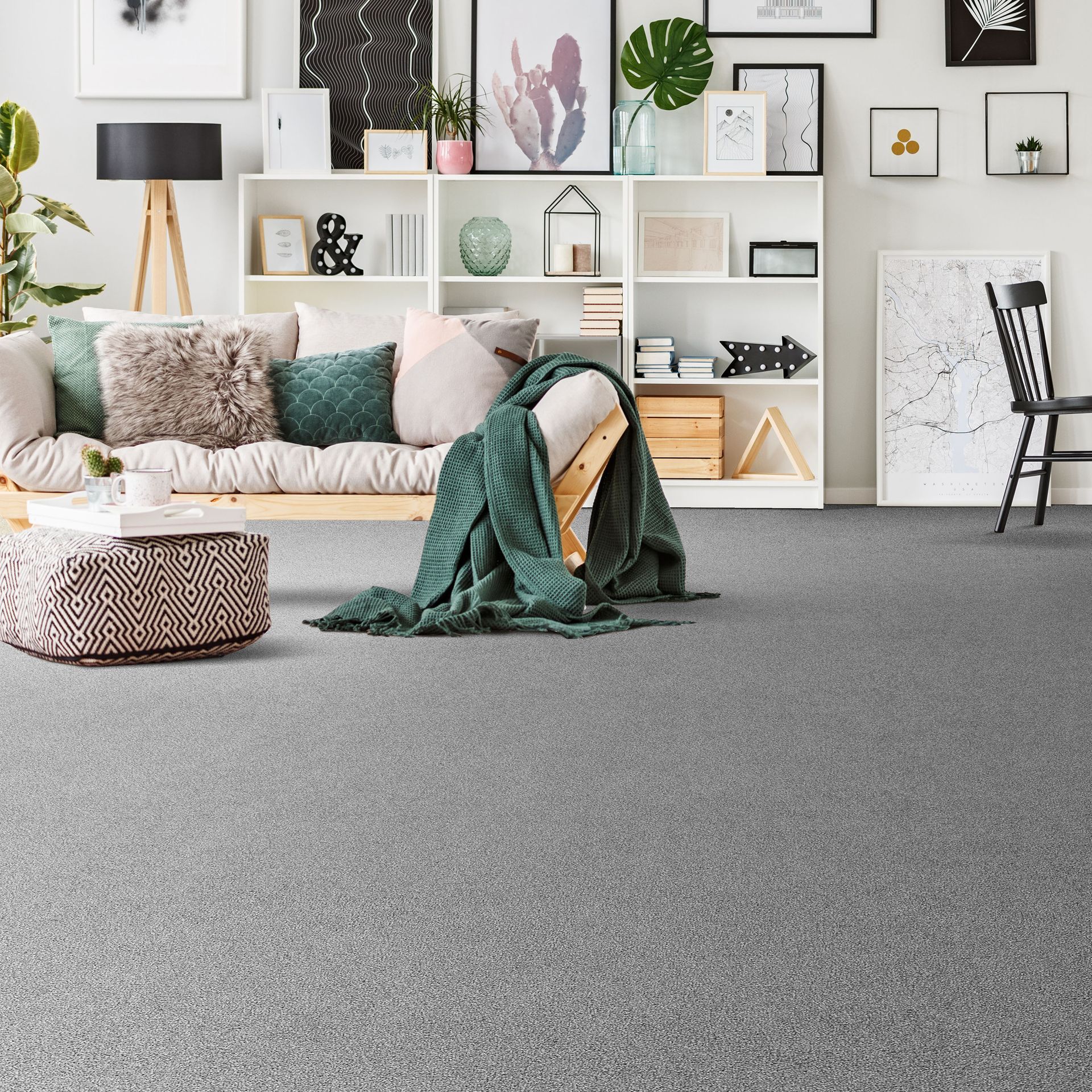 A Living Room with A Couch, Chair, Ottoman and Shelves — Mid Coast Flooring & Blinds In Forster, NSW