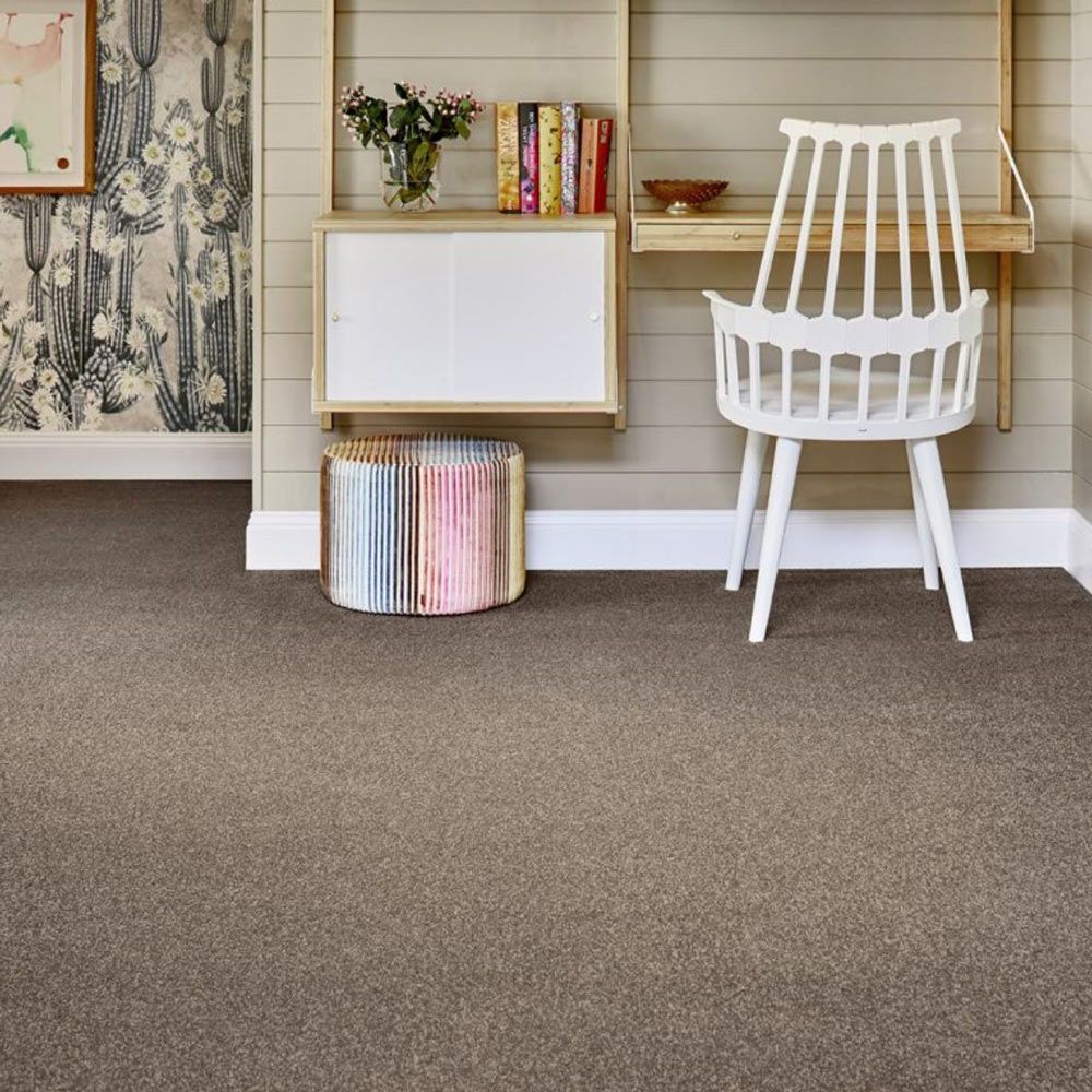 A chair is sitting in front of a desk in a room — Mid Coast Flooring & Blinds In Harrington, NSW