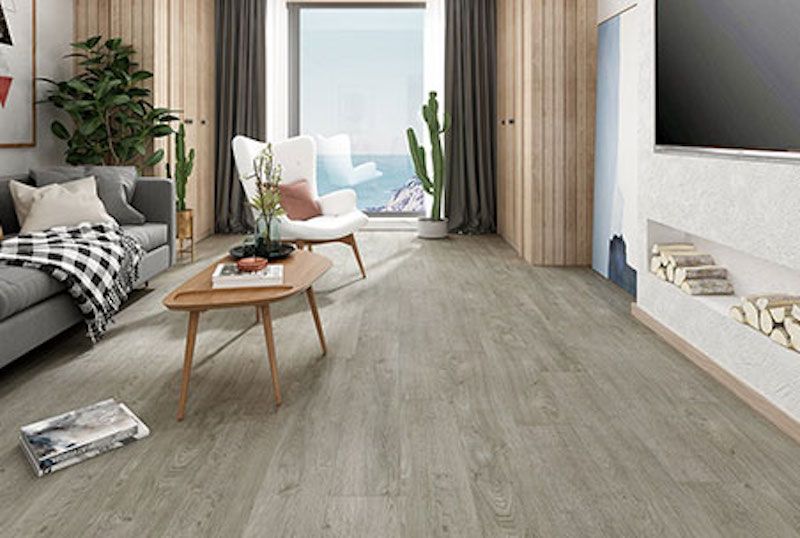 A Living Room With A Couch — Mid Coast Flooring & Blinds In Forster, NSW