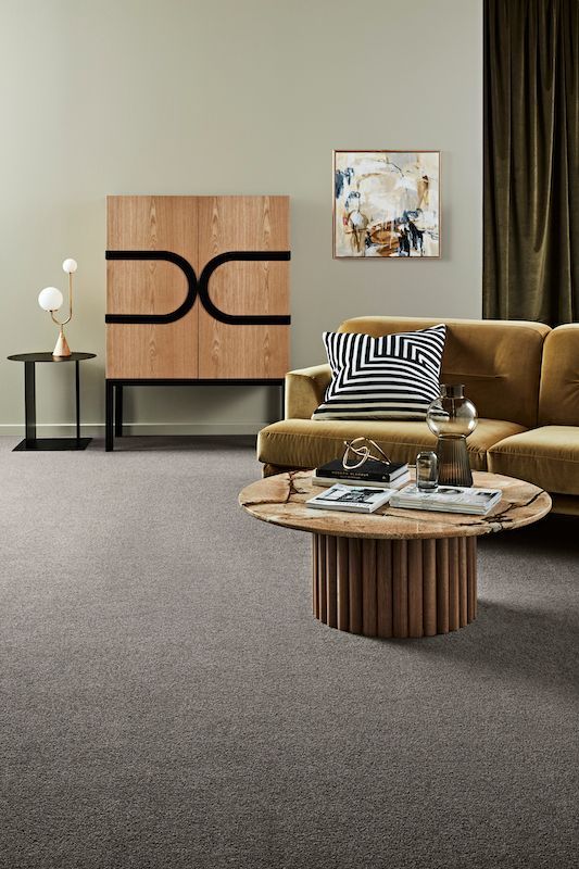 A Living Room With A Couch — Mid Coast Flooring & Blinds In Taree, NSW