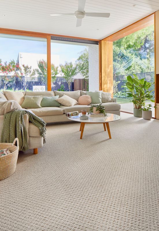 A Living Room With A Couch — Mid Coast Flooring & Blinds In Taree, NSW