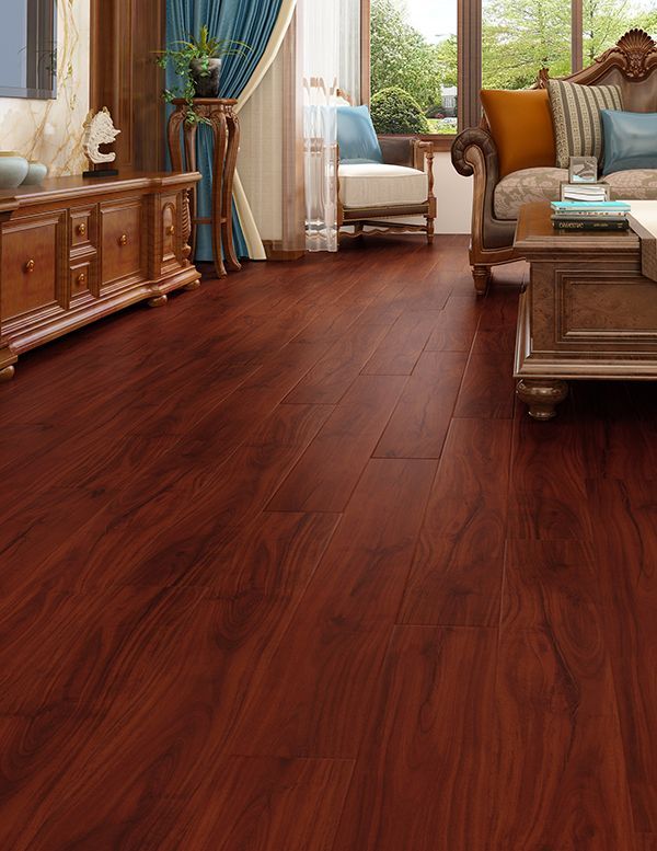 A Living Room With Hardwood Floors And Furniture — Mid Coast Flooring & Blinds In Taree, NSW