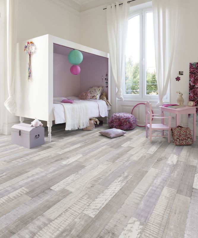 A Bedroom With A Bunk Bed And A Wooden Floor — Mid Coast Flooring & Blinds In Taree, NSW