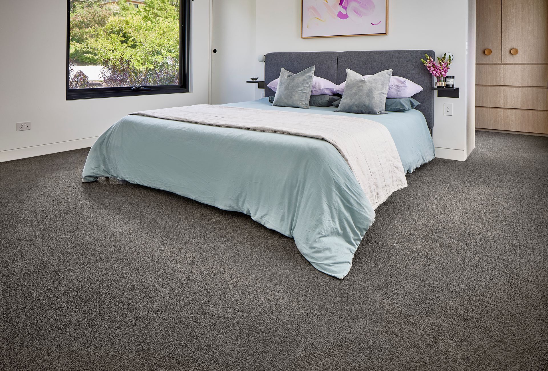 A Living Room With A Couch — Mid Coast Flooring & Blinds In Old Bar, NSW