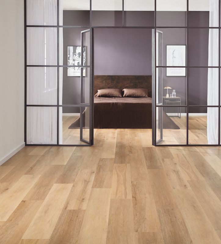 A Bedroom With Hardwood Floors And Purple Walls — Mid Coast Flooring & Blinds In Taree, NSW