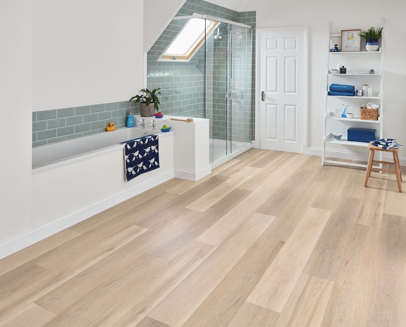 A Bathroom With Hardwood Floors — Mid Coast Flooring & Blinds In Taree, NSW