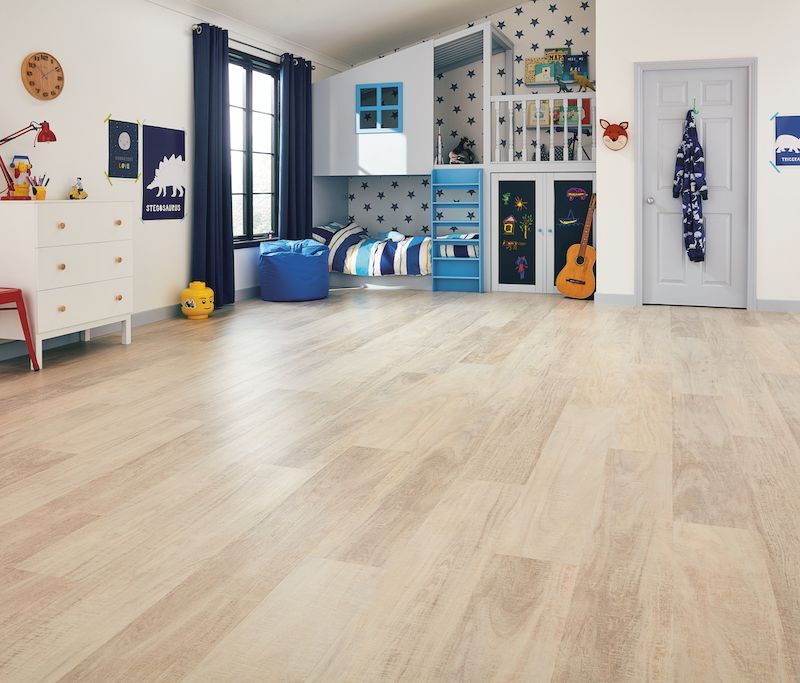 A Bedroom With A Bunk Bed And A Guitar On The Floor — Mid Coast Flooring & Blinds In Taree, NSW