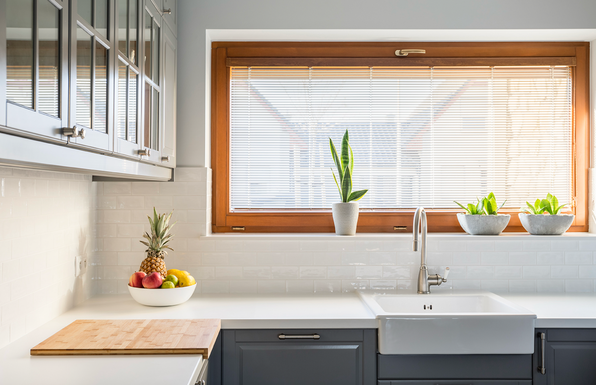 A Window With Blinds On It And A View Of Trees — Mid Coast Flooring & Blinds In Harrington, NSW