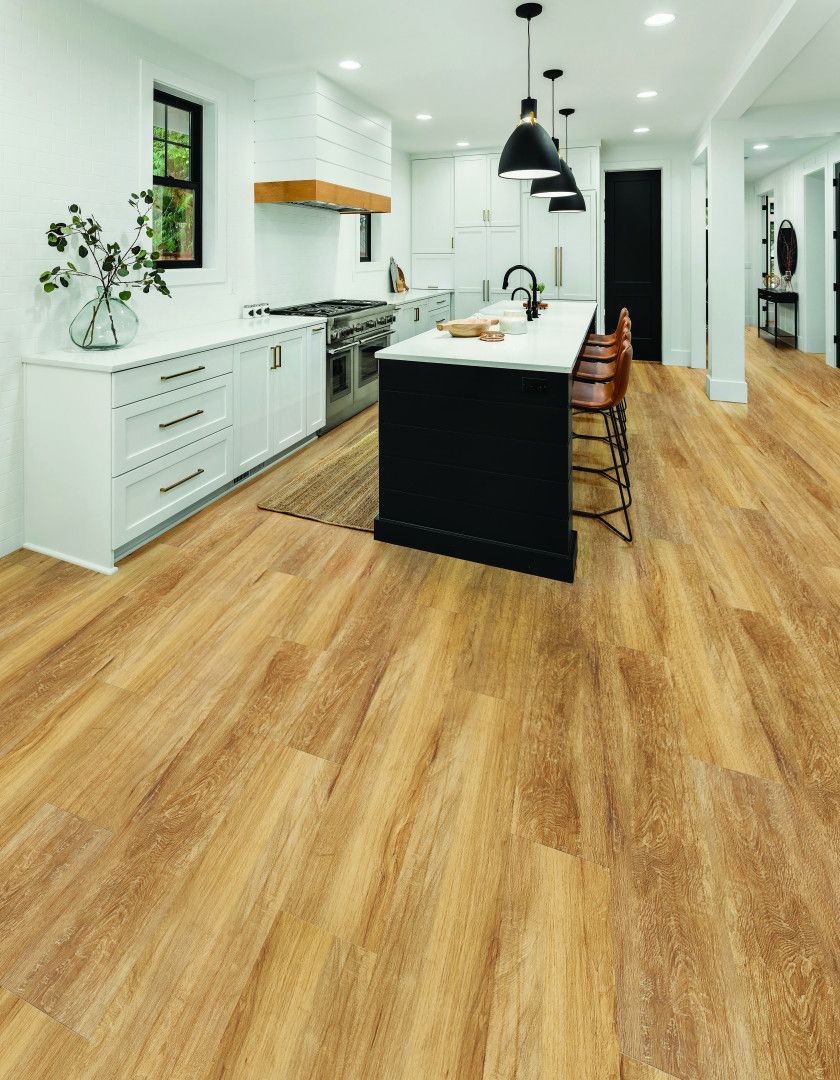 A Close Up Of A Wooden Floor In A Room — Mid Coast Flooring & Blinds In Wingham, NSW