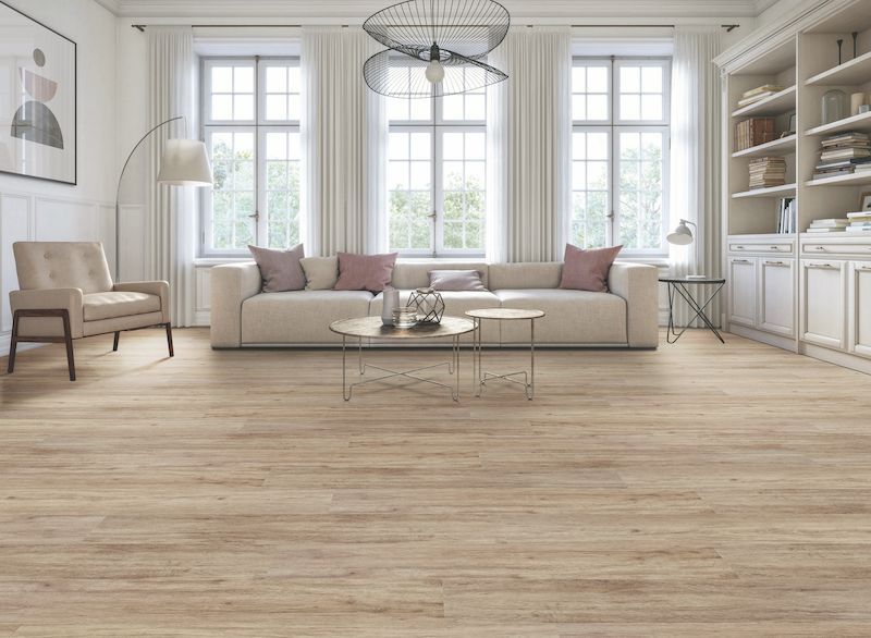A Living Room With A Couch — Mid Coast Flooring & Blinds In Old Bar, NSW