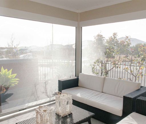 A Living Room With A Couch — Mid Coast Flooring & Blinds In Harrington, NSW