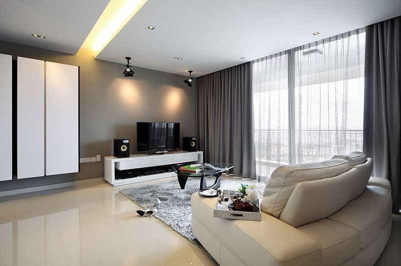 A Living Room With A White Couch And A Flat Screen TV — Mid Coast Flooring & Blinds In Wingham, NSW