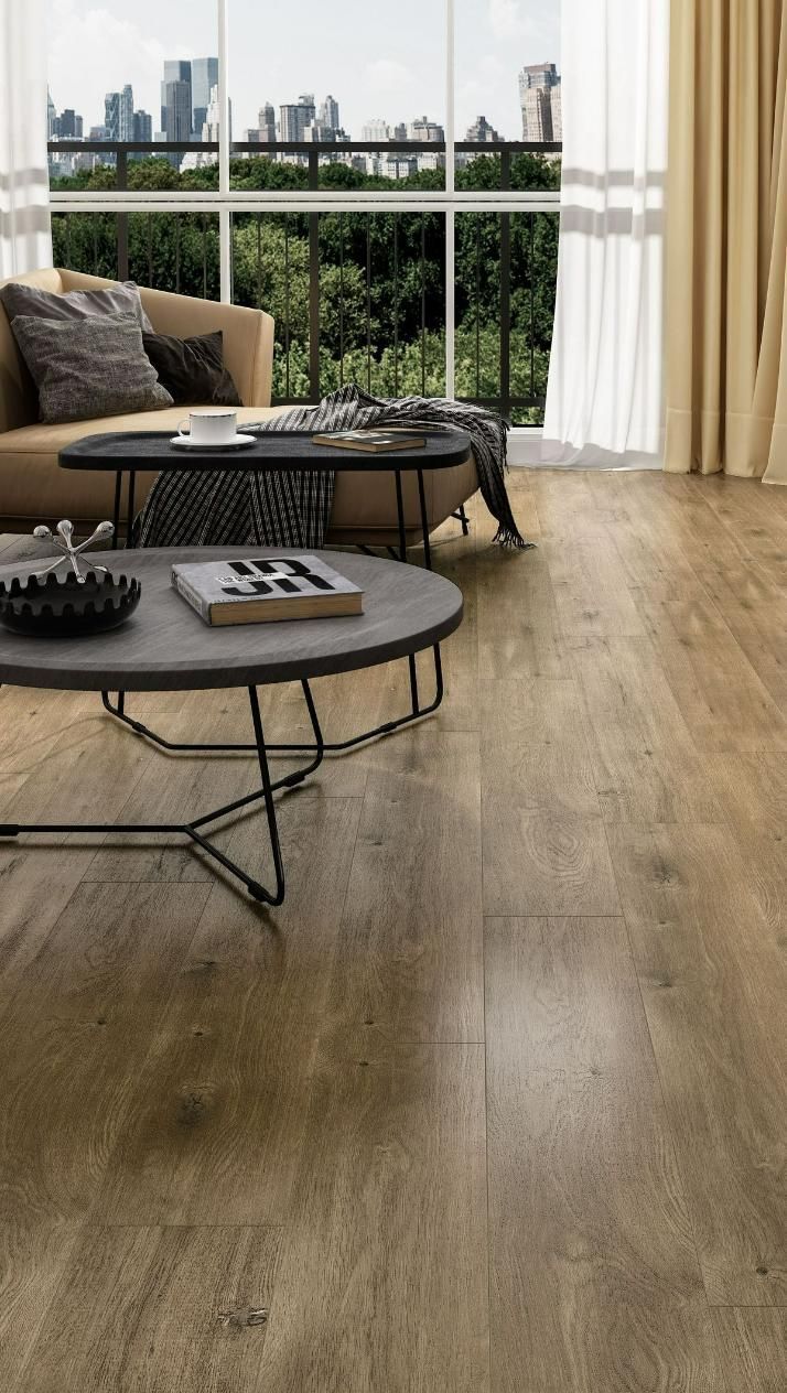 A Living Room With A Couch — Mid Coast Flooring & Blinds In Taree, NSW