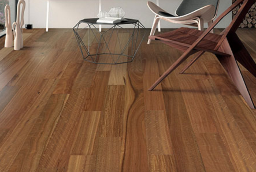 A Living Room With A Blue Couch And A Wooden Floor — Mid Coast Flooring & Blinds In Harrington, NSW