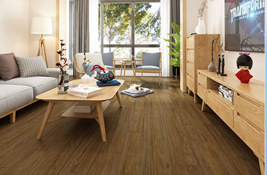 A Person Is Painting A Wooden Floor With A Brush — Mid Coast Flooring & Blinds In Laurieton, NSW