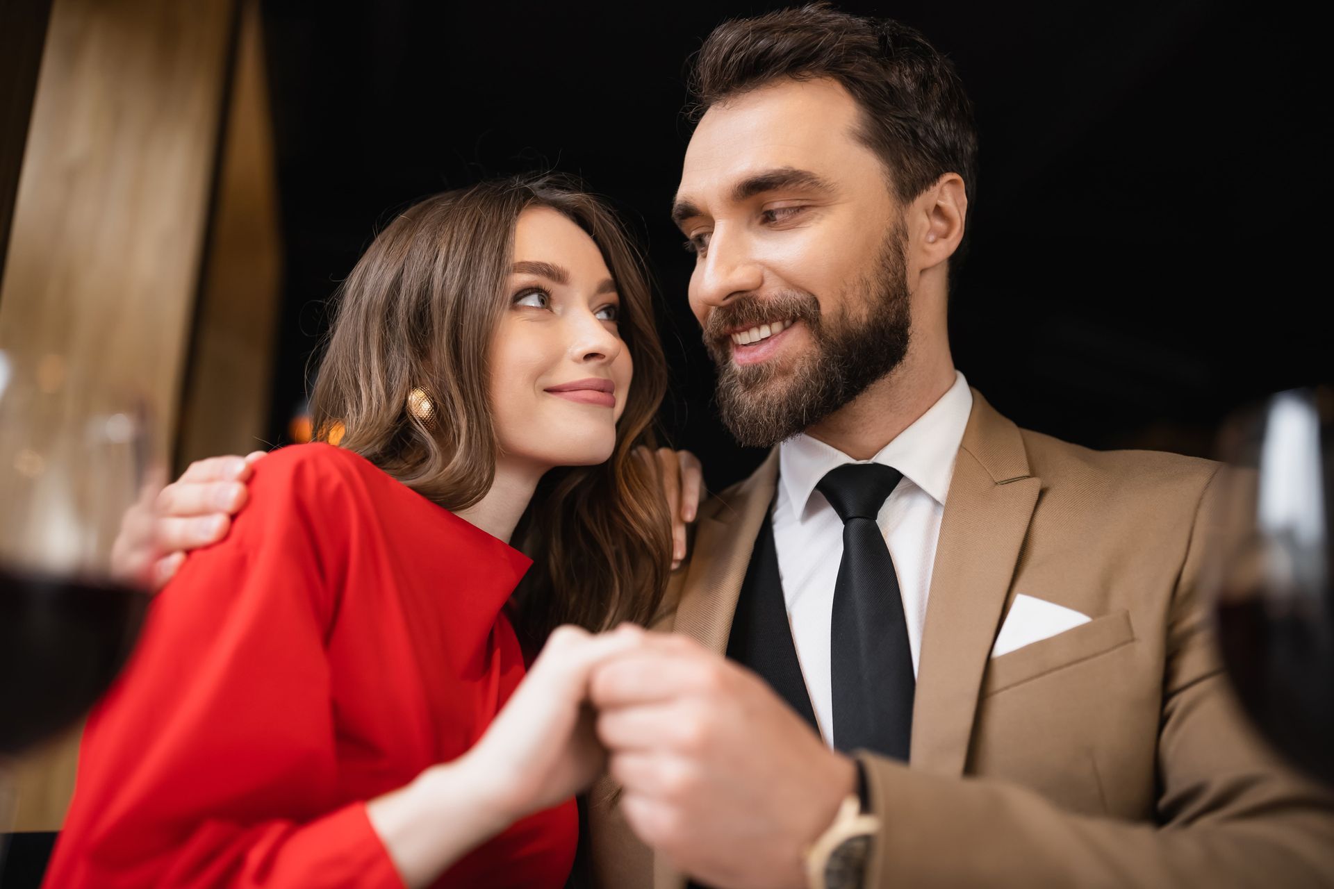 couples holding looking each other