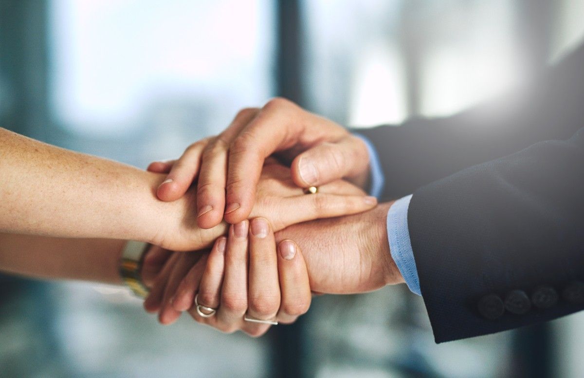 man and a girl holding each other hands