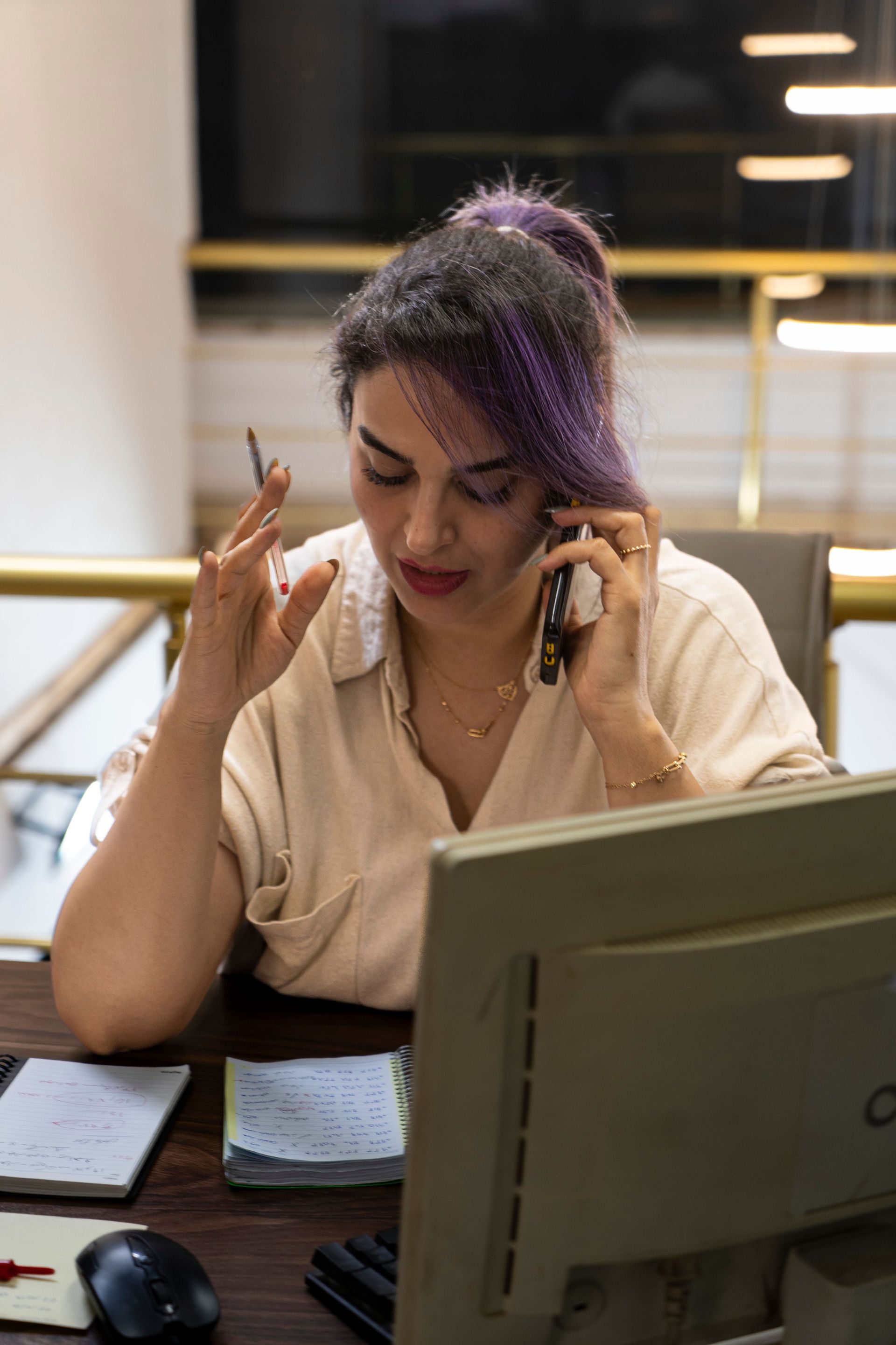 Houston businesswoman on a work call while navigating a busy dating life