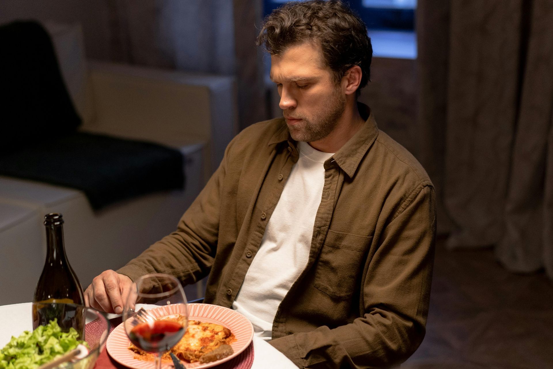 Widow enjoying a quiet evening while exploring dating and new relationships after loss