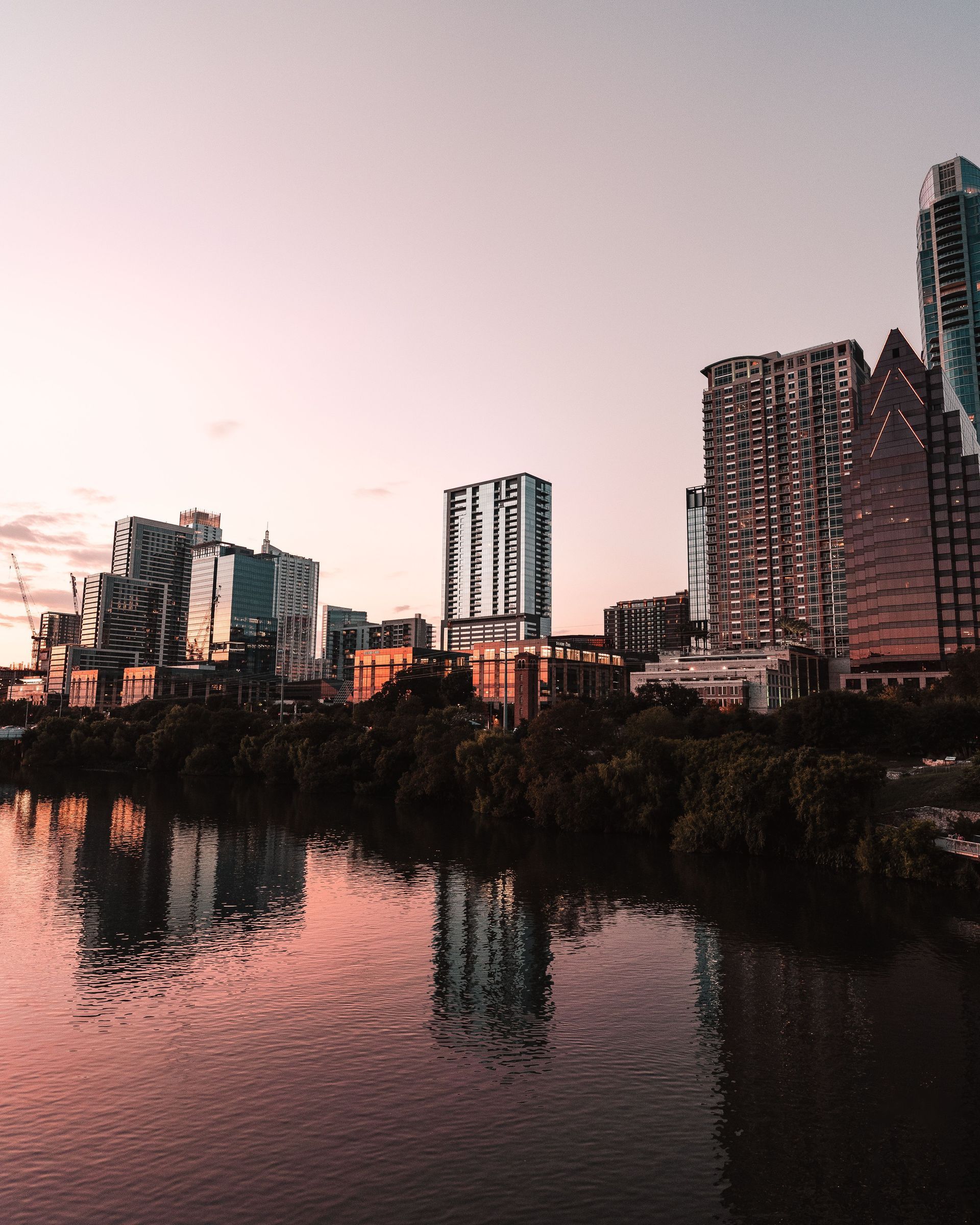 Austin Texas skyline at dusk from a rooftop terrace, representing the city's fast-growing profession